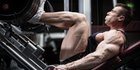 Athlete performing leg press exercise with heavy weights, showcasing muscular legs and intense focus, ideal for overcoming weightlifting plateaus.